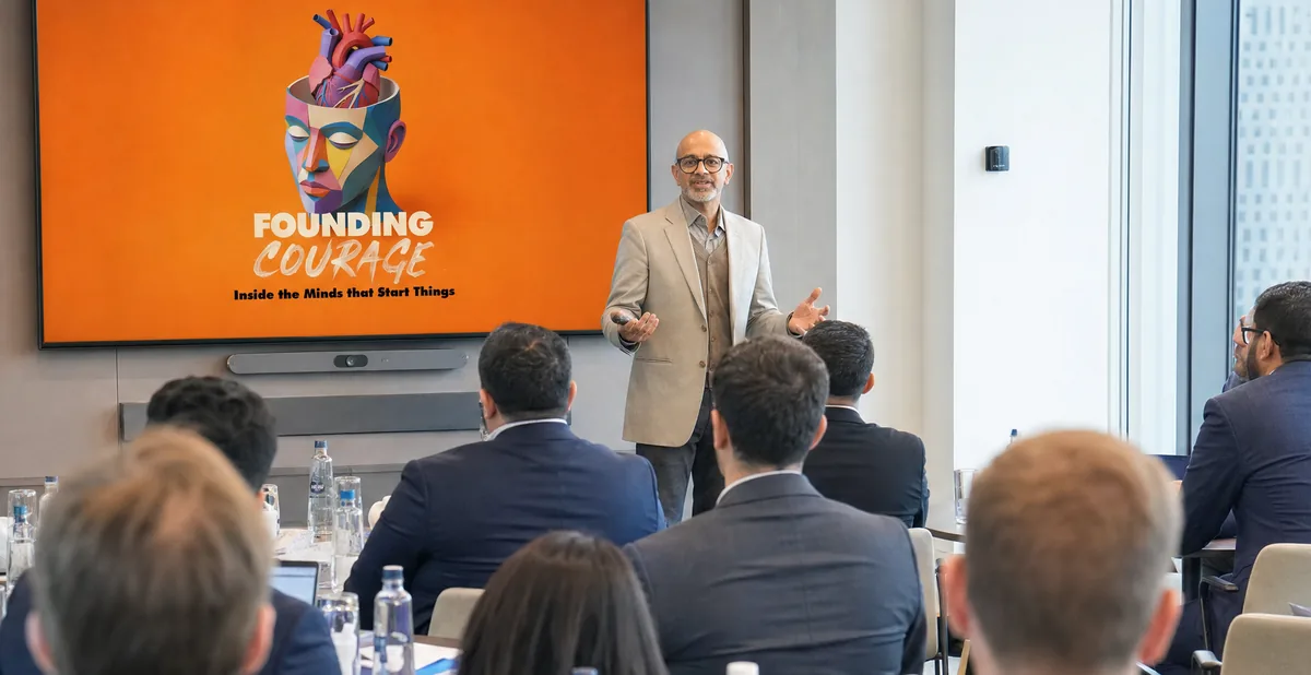 Vijay Solanki leading a workshop with a leadership team
